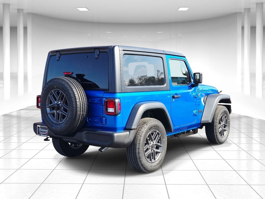 2026 Jeep Wrangler — rear three-quarter view
