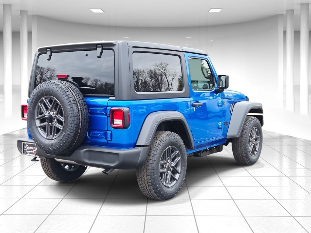 2026 Jeep Wrangler — rear three-quarter view